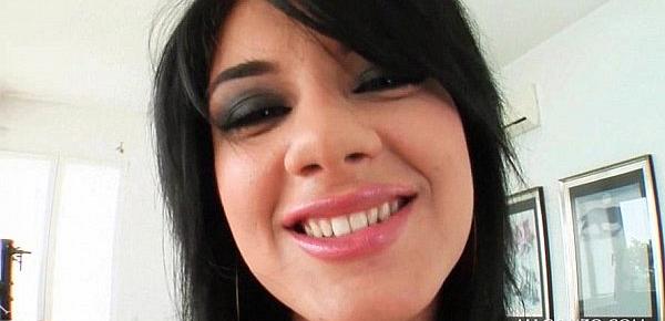 Excited brunette pleasuring her both fuck holes on cam